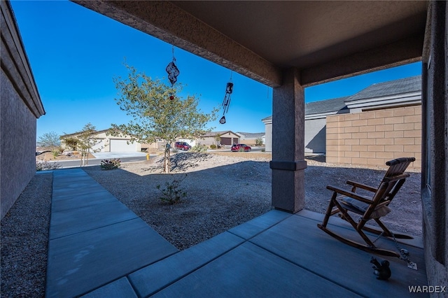 view of patio with fence