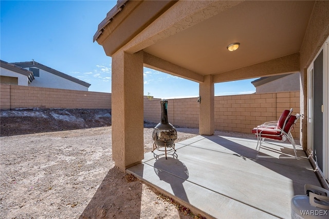 view of patio featuring a fenced backyard