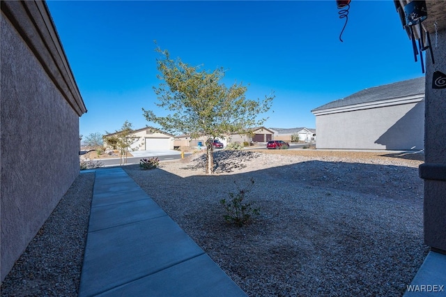 view of yard with a residential view