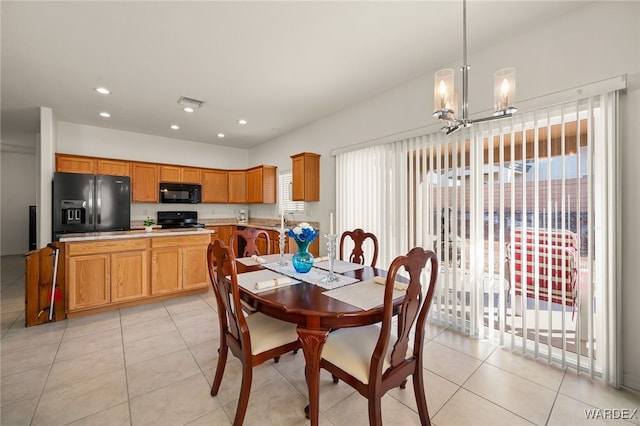 dining room featuring a notable chandelier, light tile patterned flooring, visible vents, and recessed lighting