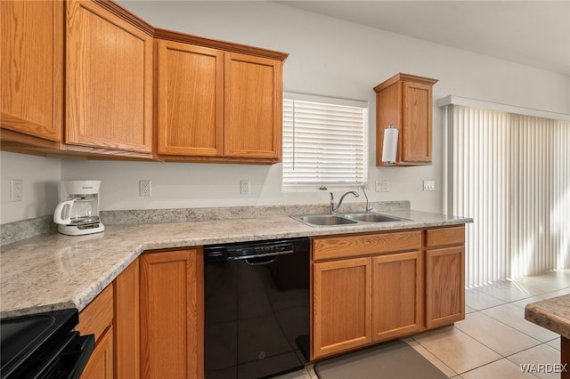 kitchen featuring light tile patterned floors, black appliances, brown cabinetry, and a sink