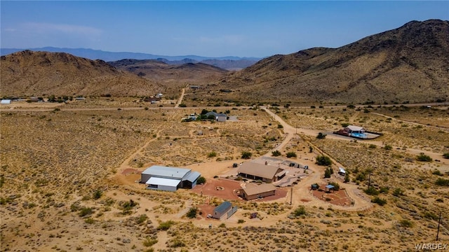 bird's eye view with a mountain view and a desert view