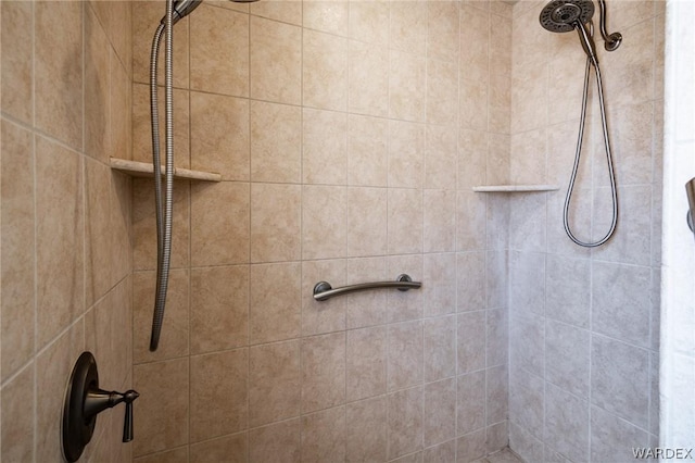 full bath featuring a tile shower