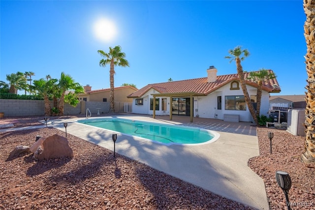 view of pool with a patio, a fenced backyard, and a fenced in pool