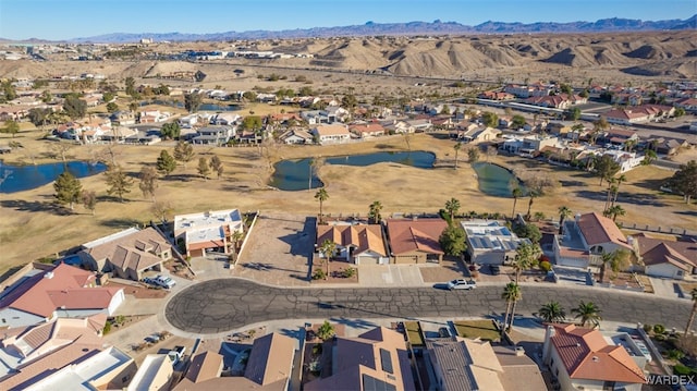 bird's eye view with a residential view and a mountain view