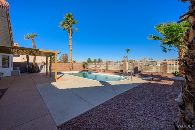 view of pool with a patio, a fenced backyard, and a fenced in pool