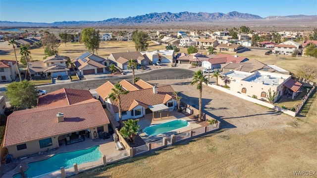 aerial view with a residential view and a mountain view