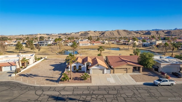 birds eye view of property featuring a residential view and a mountain view