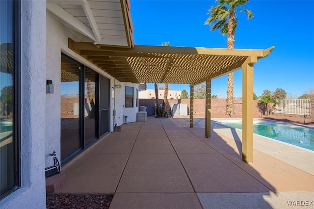 view of patio with a fenced backyard, a pergola, and a fenced in pool