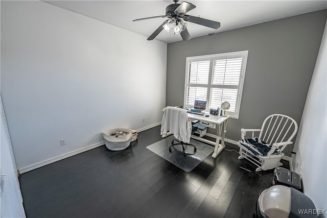 home office with dark wood-style floors, ceiling fan, and baseboards