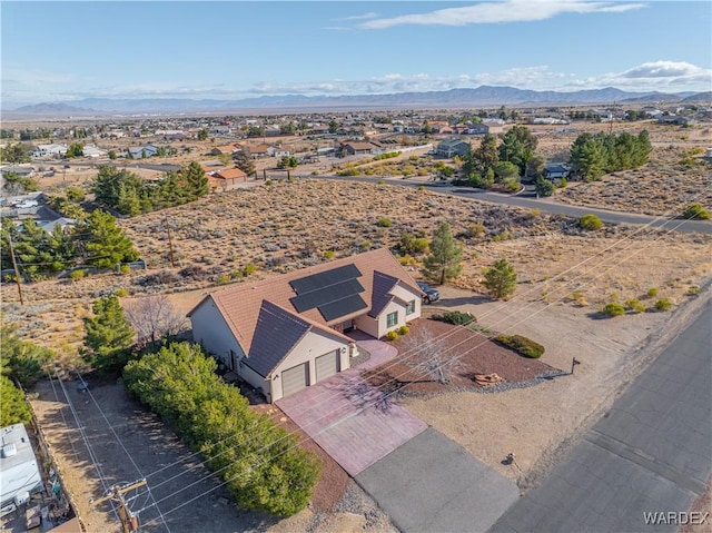 bird's eye view with a mountain view