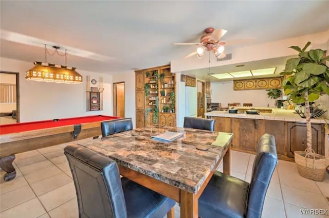 dining area featuring light tile patterned floors, billiards, and a ceiling fan