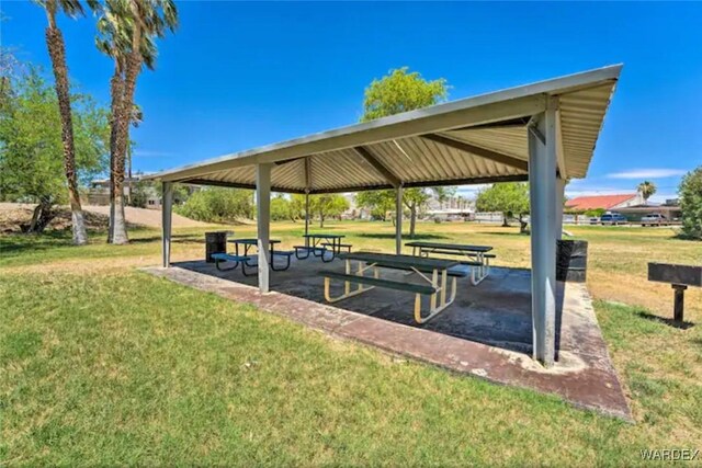 surrounding community featuring a yard and a gazebo