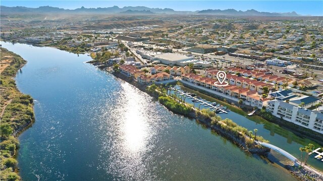 aerial view featuring a residential view and a water and mountain view