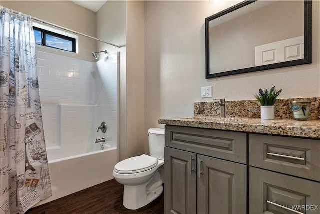 full bathroom featuring shower / tub combo, vanity, toilet, and wood finished floors