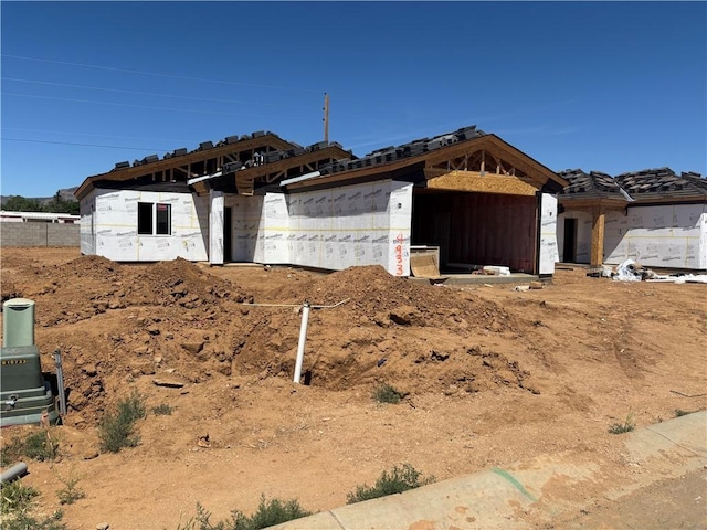 4933 N Famoso Dr, Kingman, AZ 86409 - unfinished property featuring an attached garage