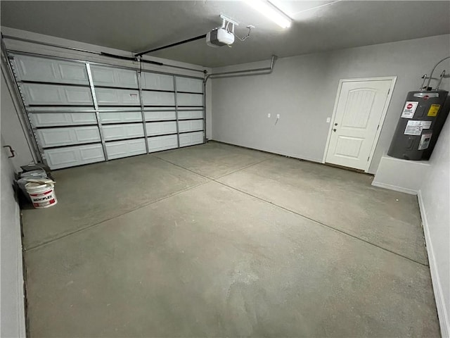 4933 N Famoso Dr, Kingman, AZ 86409 - garage featuring electric water heater and a garage door opener
