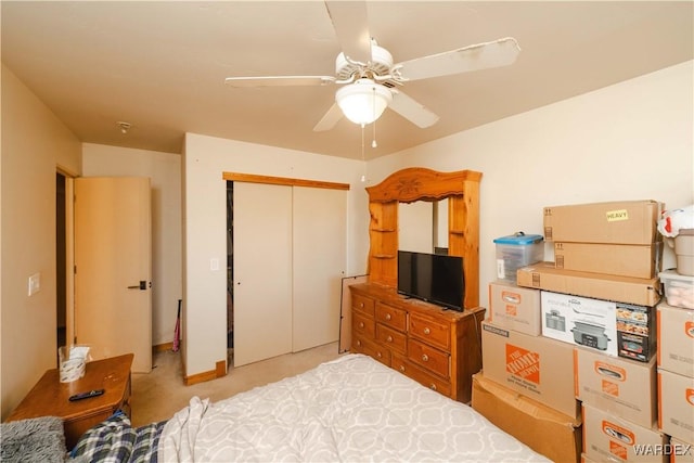 bedroom featuring a closet and a ceiling fan