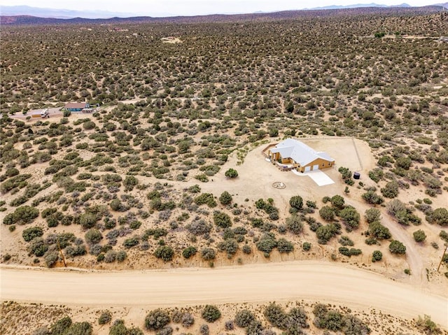 9076 E Mountain Shadow Rd, Kingman, AZ 86401 - view from above of property featuring a mountainous background and a desert landscape