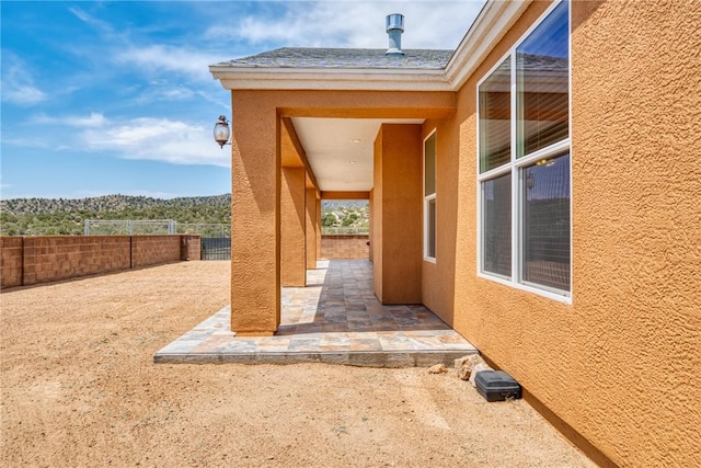 9076 E Mountain Shadow Rd, Kingman, AZ 86401 - fenced backyard featuring a patio area and a mountain view