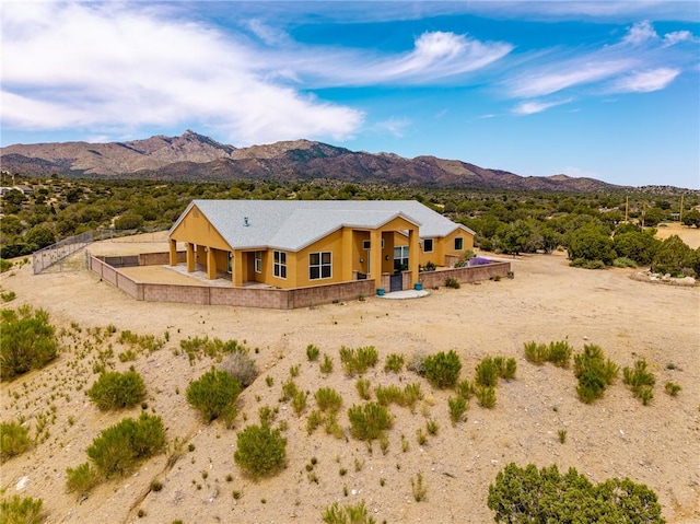 9076 E Mountain Shadow Rd, Kingman, AZ 86401 - view of front of house with a mountain view and stucco siding