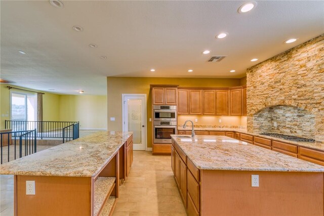 9076 E Mountain Shadow Rd, Kingman, AZ 86401 - kitchen with a kitchen island with sink, stainless steel appliances, open shelves, recessed lighting, and a sink
