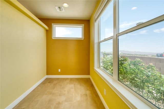 9076 E Mountain Shadow Rd, Kingman, AZ 86401 - spare room featuring plenty of natural light, baseboards, and recessed lighting