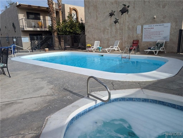 1280 Mohave Dr Unit 13, Bullhead City, AZ 86442 - pool with a patio and fence