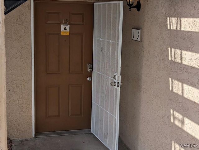 1280 Mohave Dr Unit 13, Bullhead City, AZ 86442 - doorway to property with stucco siding