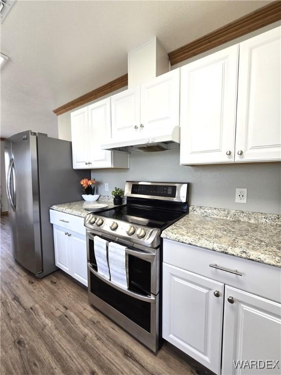 kitchen featuring dark wood-style floors, under cabinet range hood, appliances with stainless steel finishes, and white cabinets