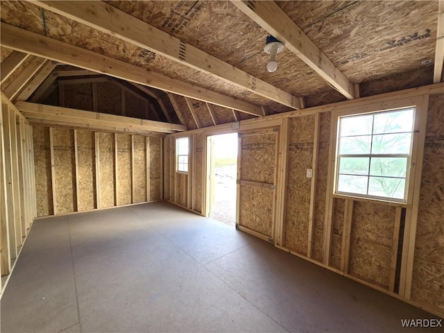 miscellaneous room featuring vaulted ceiling