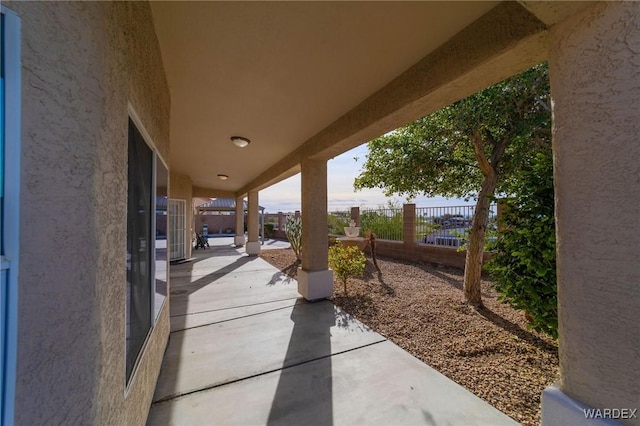 view of patio with fence