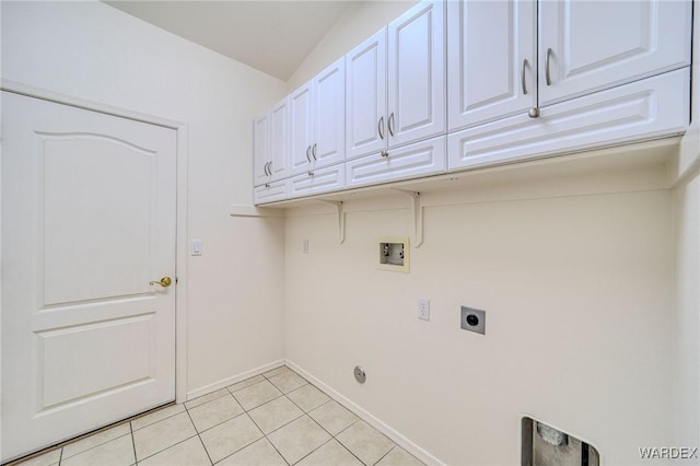 laundry area with light tile patterned flooring, washer hookup, baseboards, cabinet space, and electric dryer hookup