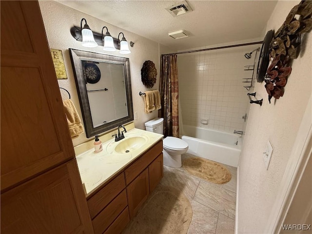 bathroom featuring shower / tub combo, visible vents, a textured wall, and a textured ceiling