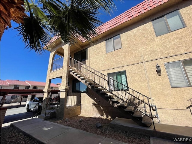 view of building exterior with stairs