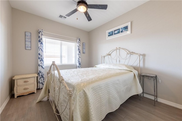 2178 E Via Lucio, Fort Mohave, AZ 86426 - bedroom with baseboards, wood finished floors, and a ceiling fan