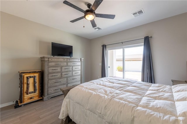 2178 E Via Lucio, Fort Mohave, AZ 86426 - bedroom featuring light wood-style flooring, baseboards, a ceiling fan, and access to exterior
