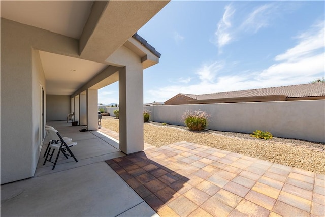 2178 E Via Lucio, Fort Mohave, AZ 86426 - fenced backyard featuring a patio area