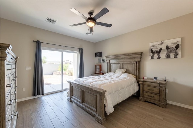 2178 E Via Lucio, Fort Mohave, AZ 86426 - bedroom with access to exterior, light wood-style floors, baseboards, and a ceiling fan