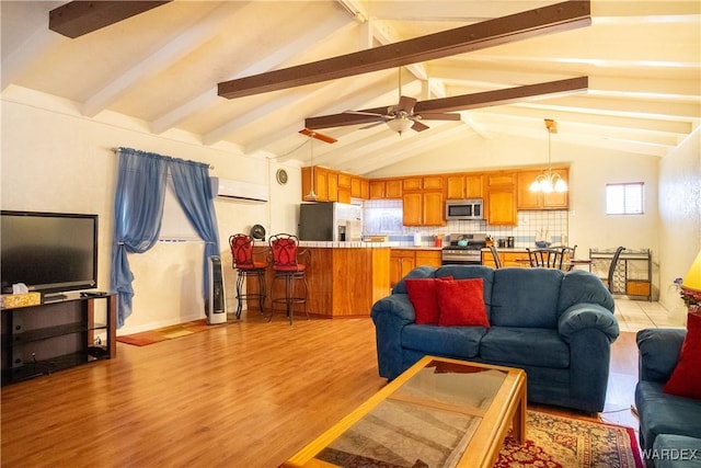 living room featuring vaulted ceiling with beams, light wood-style floors, and ceiling fan with notable chandelier