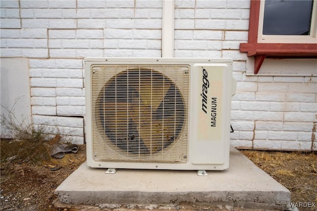 details with brick siding and ac unit