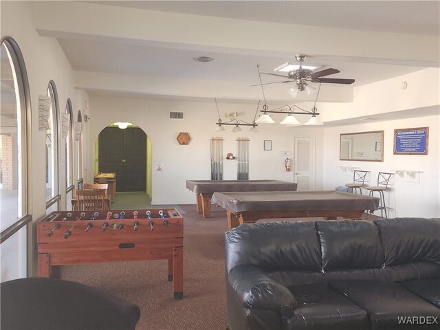 playroom featuring billiards, visible vents, arched walkways, a ceiling fan, and carpet