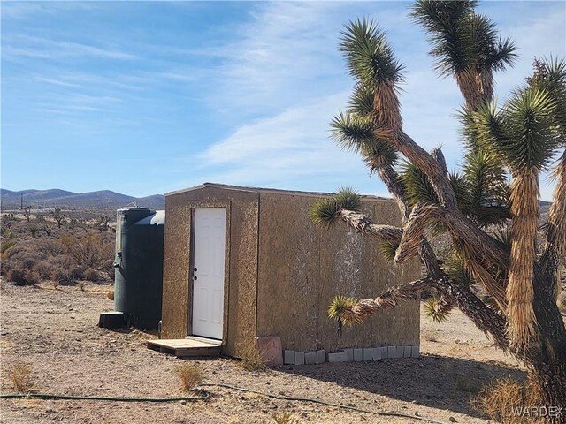 view of outdoor structure with a mountain view