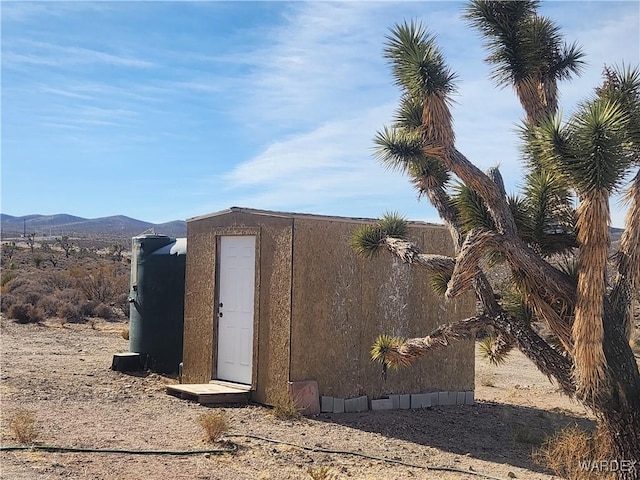 view of shed featuring a mountain view