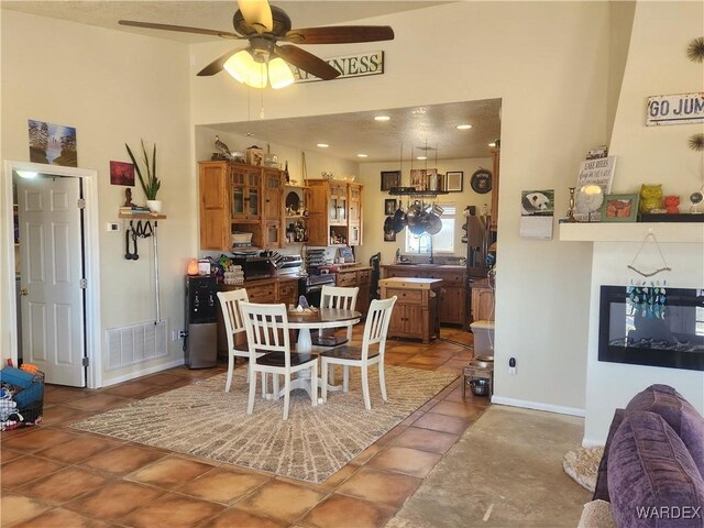 dining area with ceiling fan, recessed lighting, visible vents, baseboards, and tile patterned floors