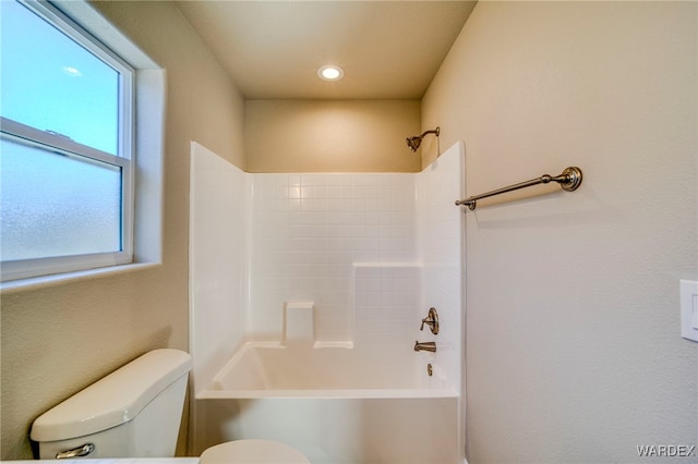 full bathroom featuring toilet and shower / bathtub combination