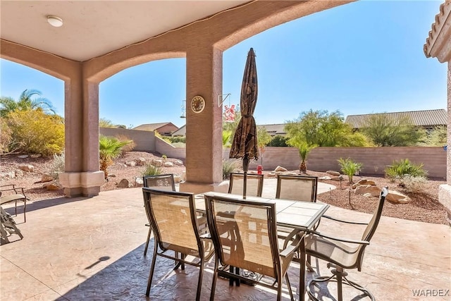 view of patio / terrace with outdoor dining area and a fenced backyard