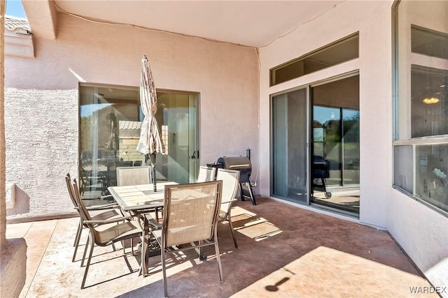 view of patio with outdoor dining area