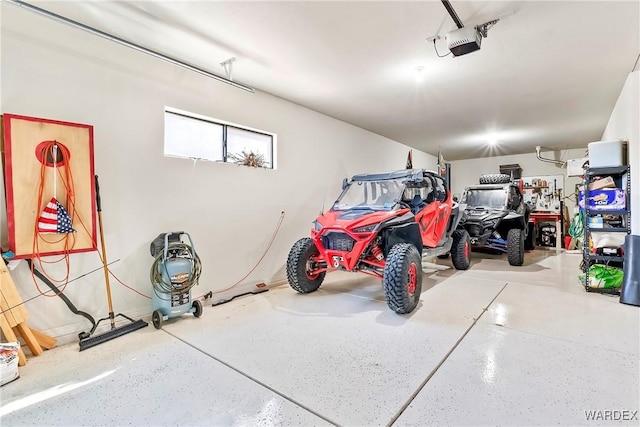 garage featuring a garage door opener