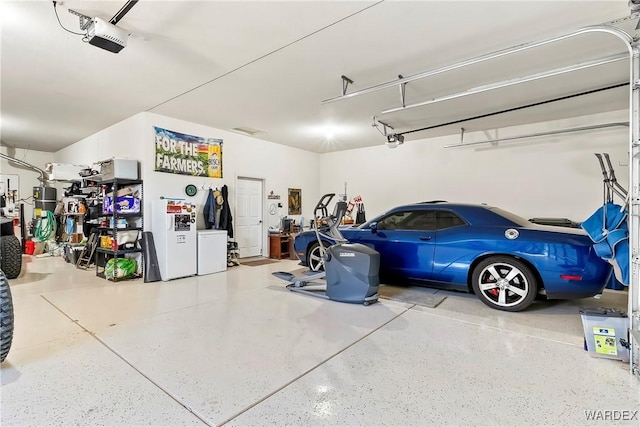 garage featuring a garage door opener